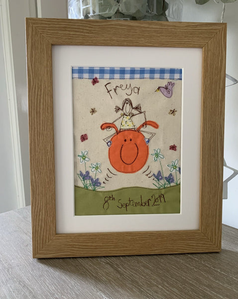 Freehand machine embroidered picture, space hopper